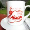 Tasse mit Logo der Bäckerei Maier